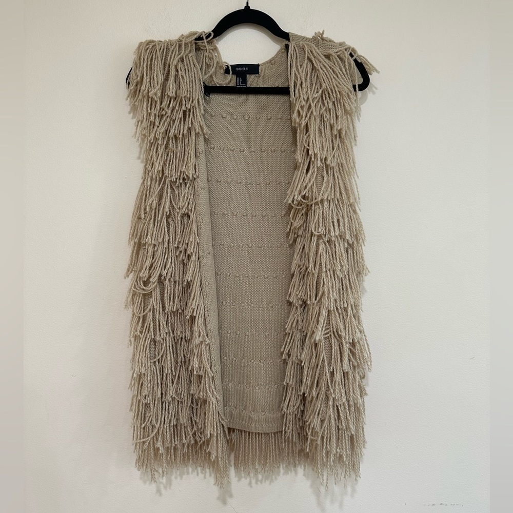 Forever 21 sleeves fringe vest size small. Nude color